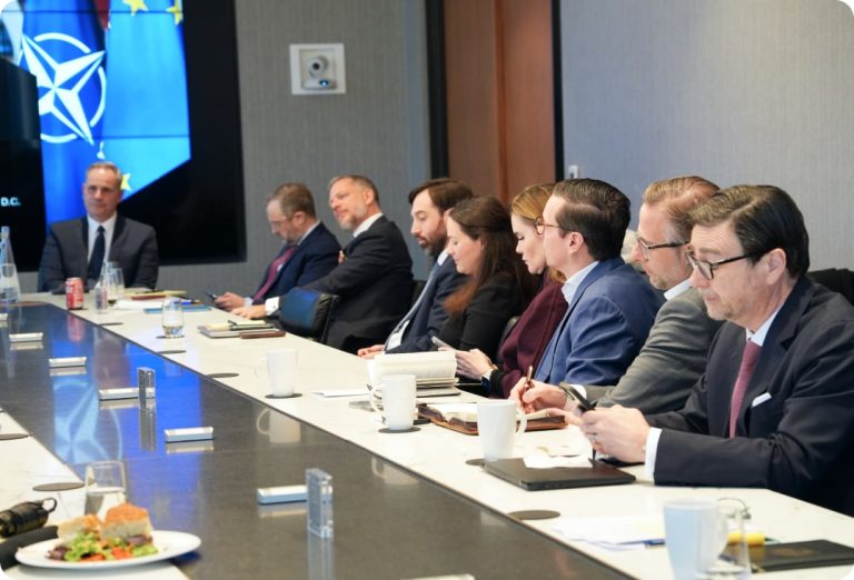 Officials and experts around a conference table at a CELIS roundtable
