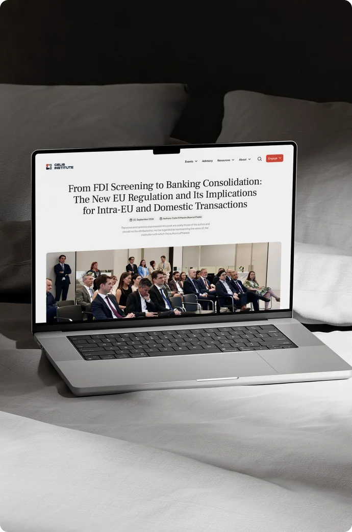 Laptop on a bed showing a CELIS blog article